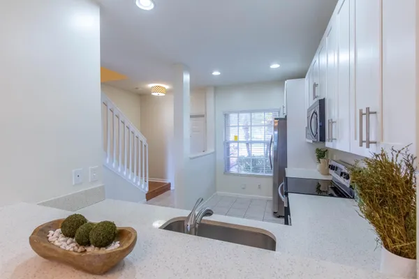 a room with furniture and a large window