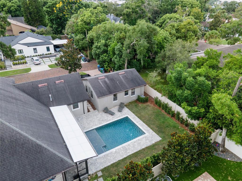 1451 Lyndale Boulevard Winter Park, FL 32789 - Photo 17 of 89 an aerial view of a house with swimming pool and garden
