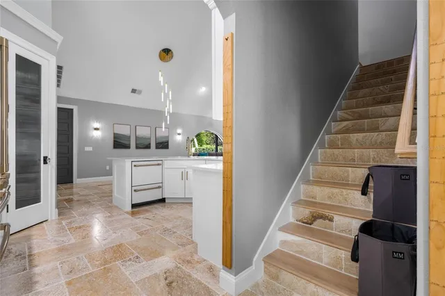 a living room with furniture or window and a wooden floor