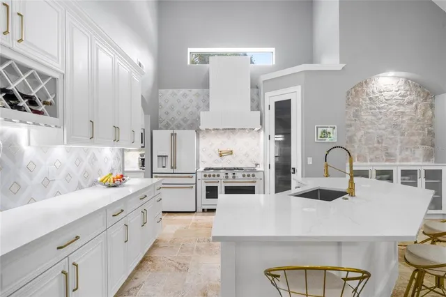 a bedroom with a bed and a table