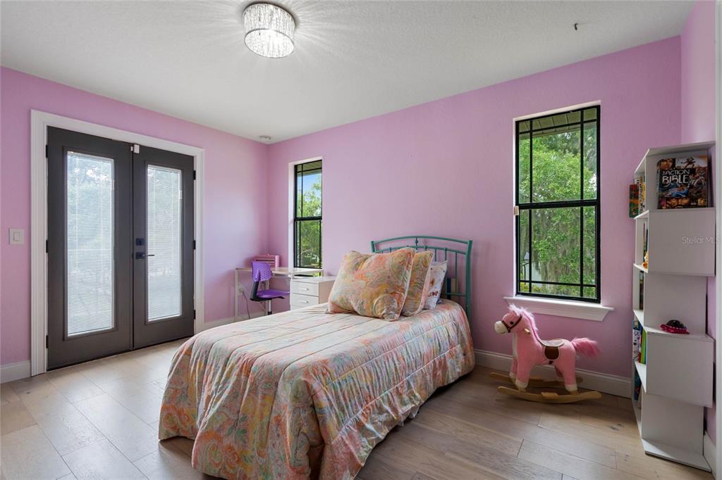 1451 Lyndale Boulevard Winter Park, FL 32789 - Photo 67 of 89 a bedroom with a bed and a window