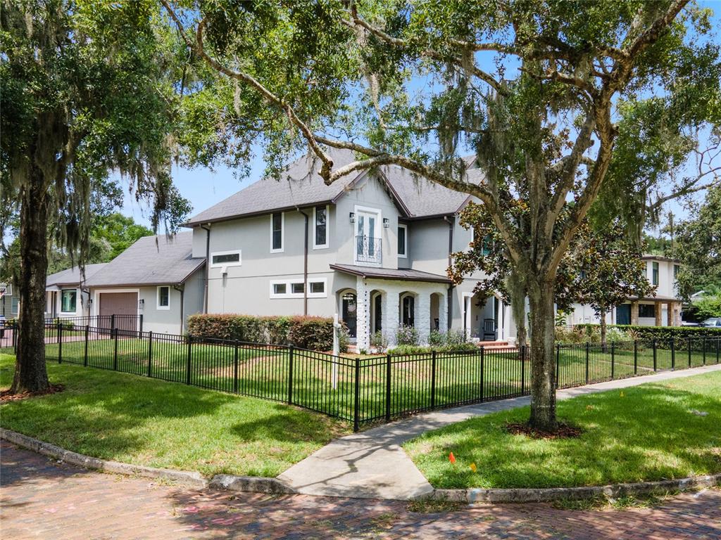 1451 Lyndale Boulevard Winter Park, FL 32789 - Photo 8 of 89 a front view of a house with a yard table and chairs