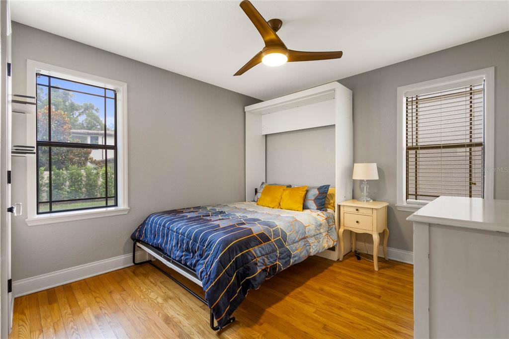 1451 Lyndale Boulevard Winter Park, FL 32789 - Photo 88 of 89 a bedroom with a bed and a window