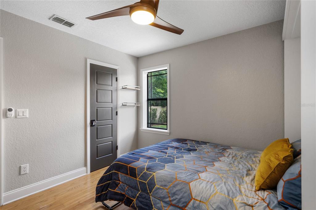 1451 Lyndale Boulevard Winter Park, FL 32789 - Photo 89 of 89 a bedroom with a bed and a window