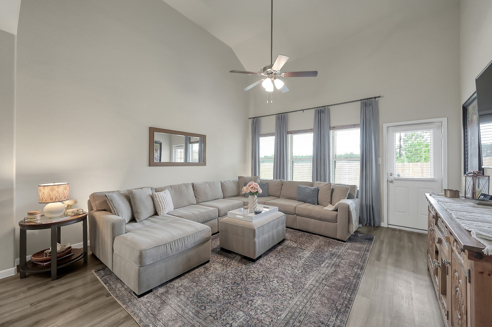679 Red Elm Lane Conroe, TX 77304 - Photo 15 of 45 a living room with furniture and a large window