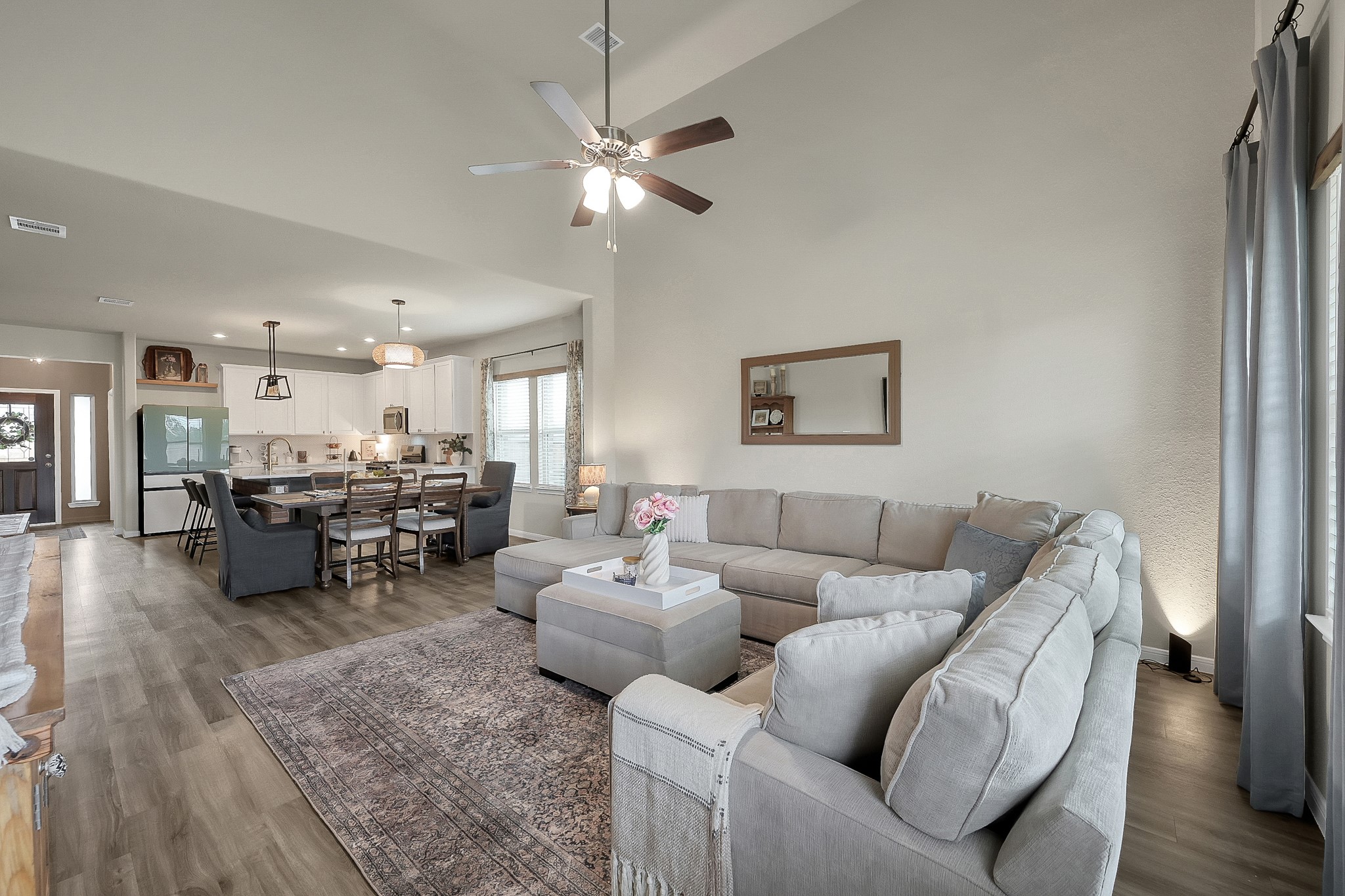 679 Red Elm Lane Conroe, TX 77304 - Photo 17 of 45 a living room with furniture and wooden floor