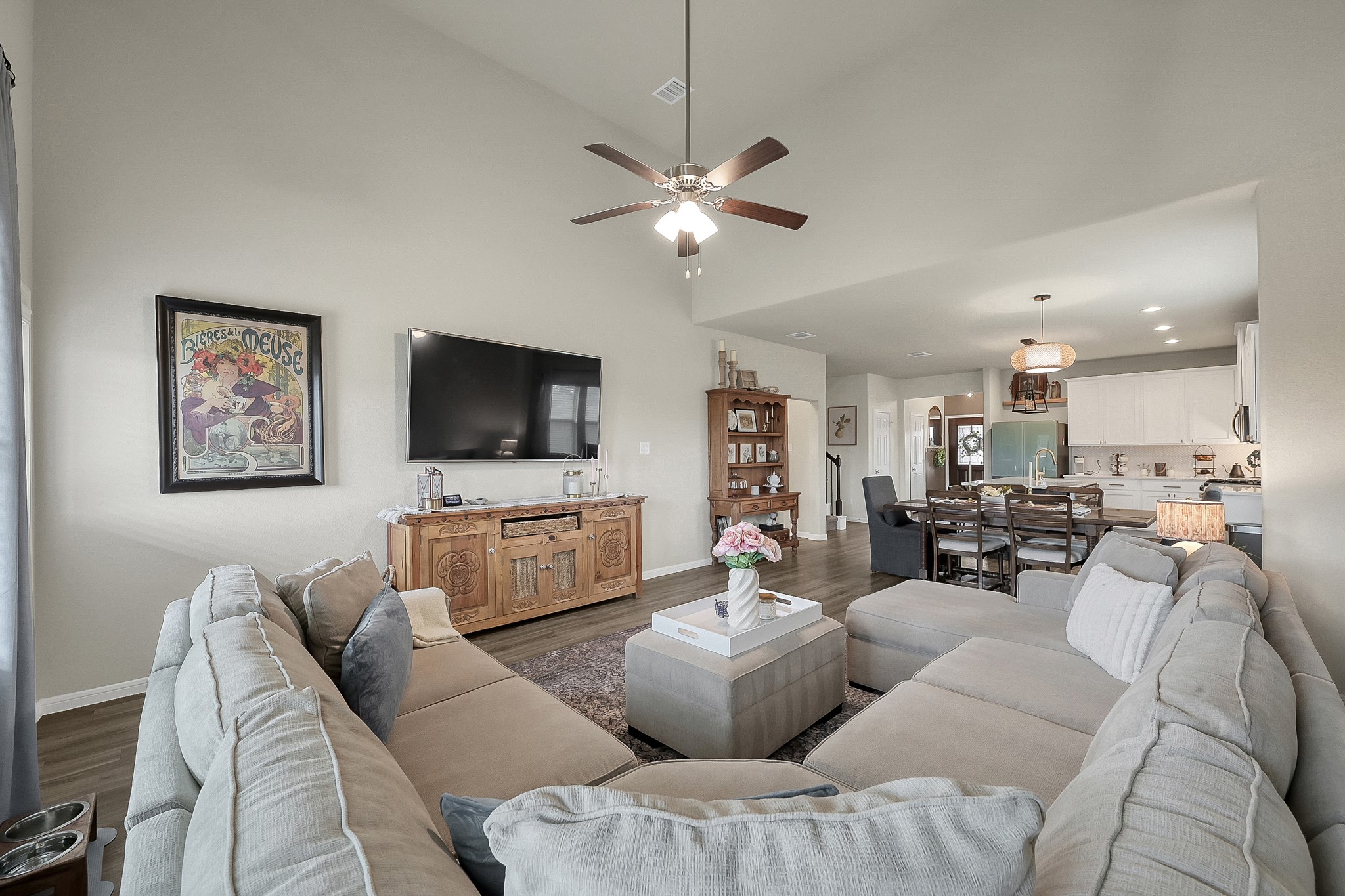 679 Red Elm Lane Conroe, TX 77304 - Photo 18 of 45 a living room with furniture and a flat screen tv