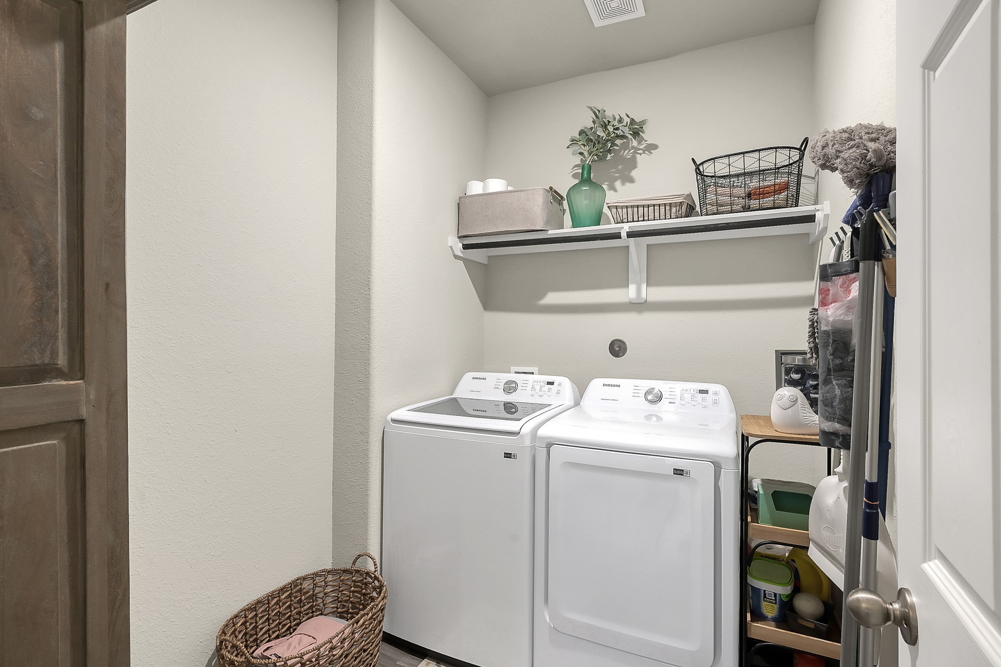 679 Red Elm Lane Conroe, TX 77304 - Photo 19 of 45 a utility room with dryer and washer