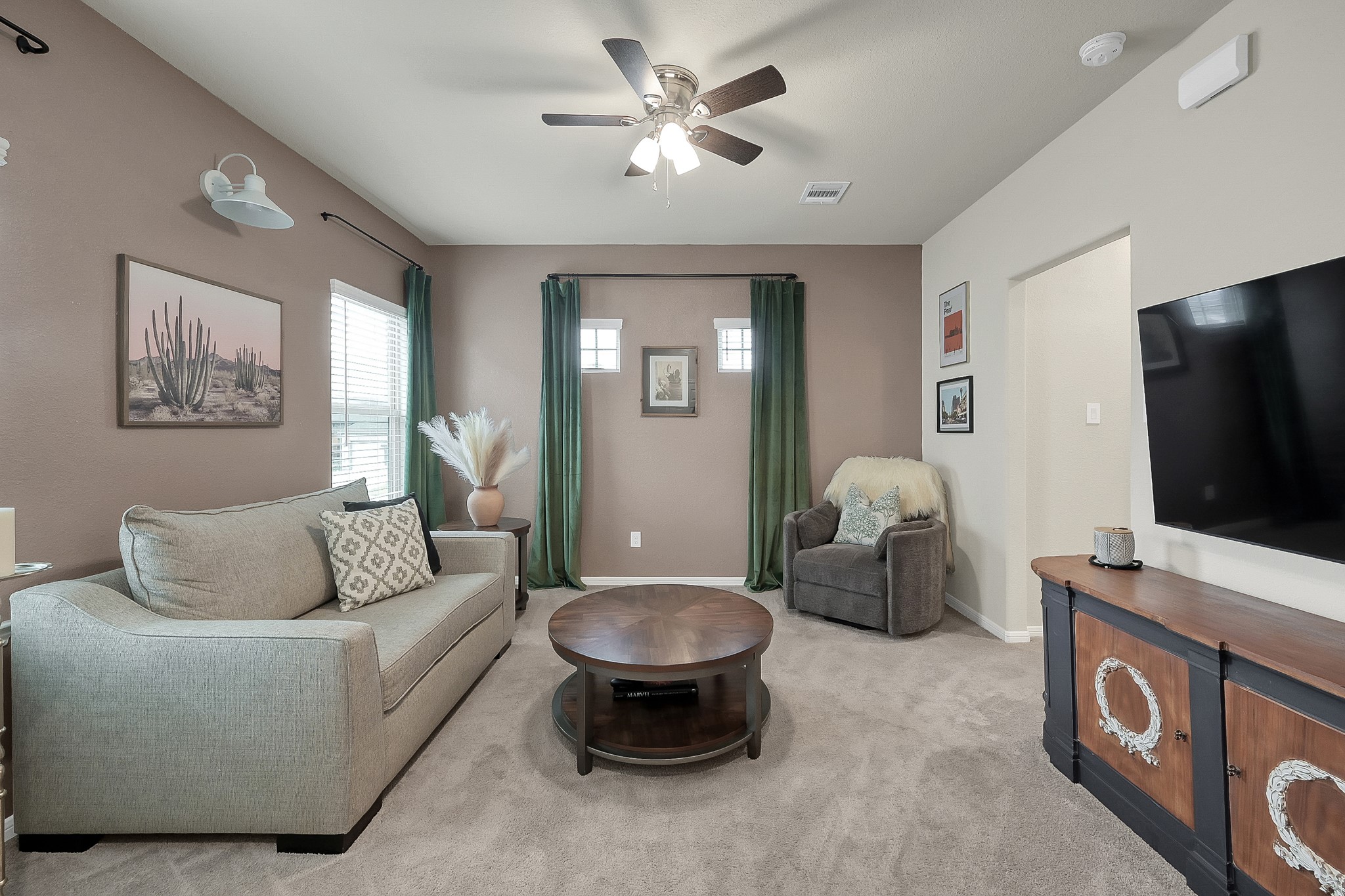 679 Red Elm Lane Conroe, TX 77304 - Photo 27 of 45 a living room with furniture and a flat screen tv