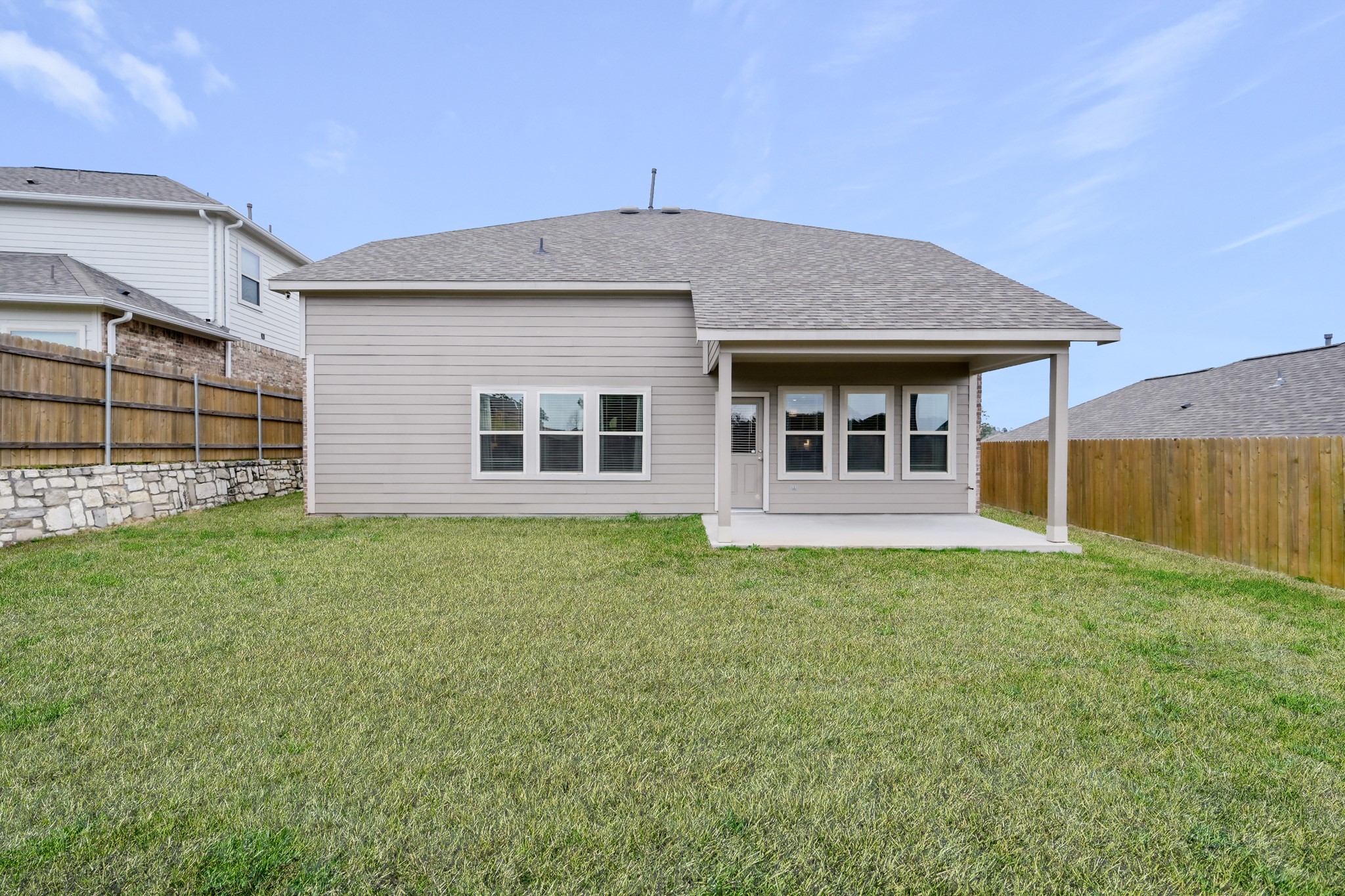 679 Red Elm Lane Conroe, TX 77304 - Photo 38 of 45 a house view with a garden space