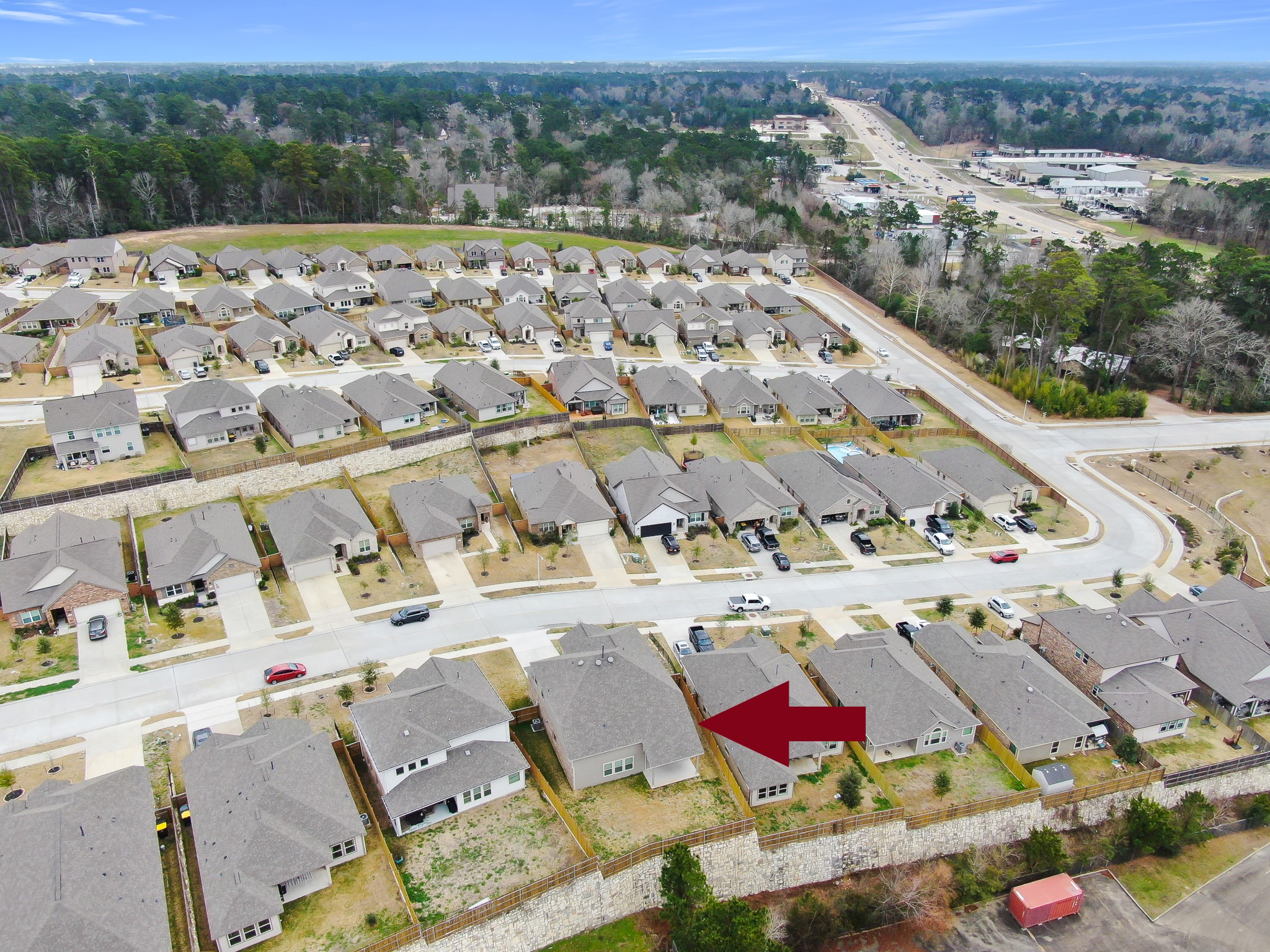 679 Red Elm Lane Conroe, TX 77304 - Photo 44 of 45 an aerial view of a city