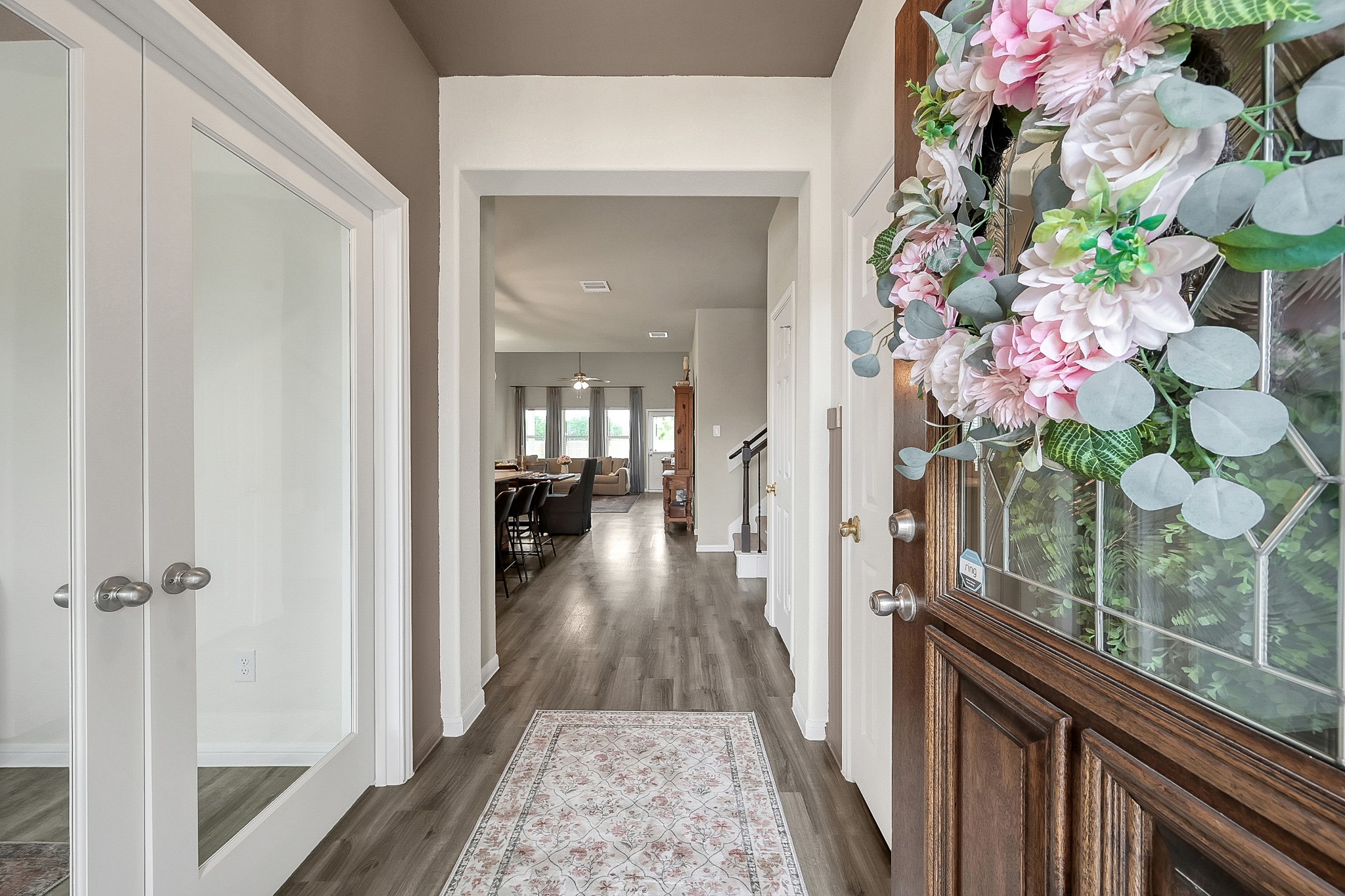 679 Red Elm Lane Conroe, TX 77304 - Photo 5 of 45 a view of a hallway and wooden floor