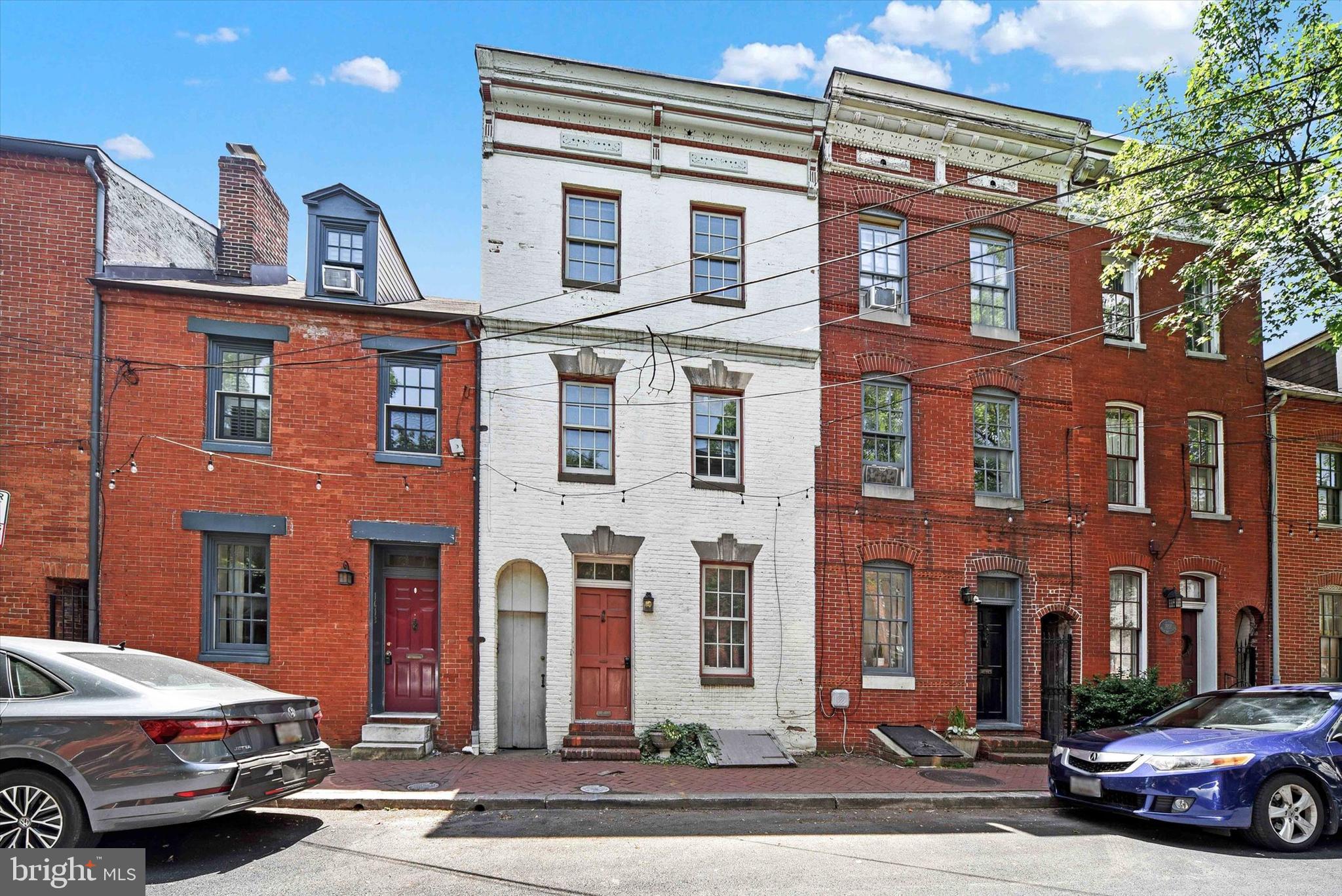 1611 Lancaster Street Baltimore, MD 21231 - Photo 2 of 43 a car parked in front of a building
