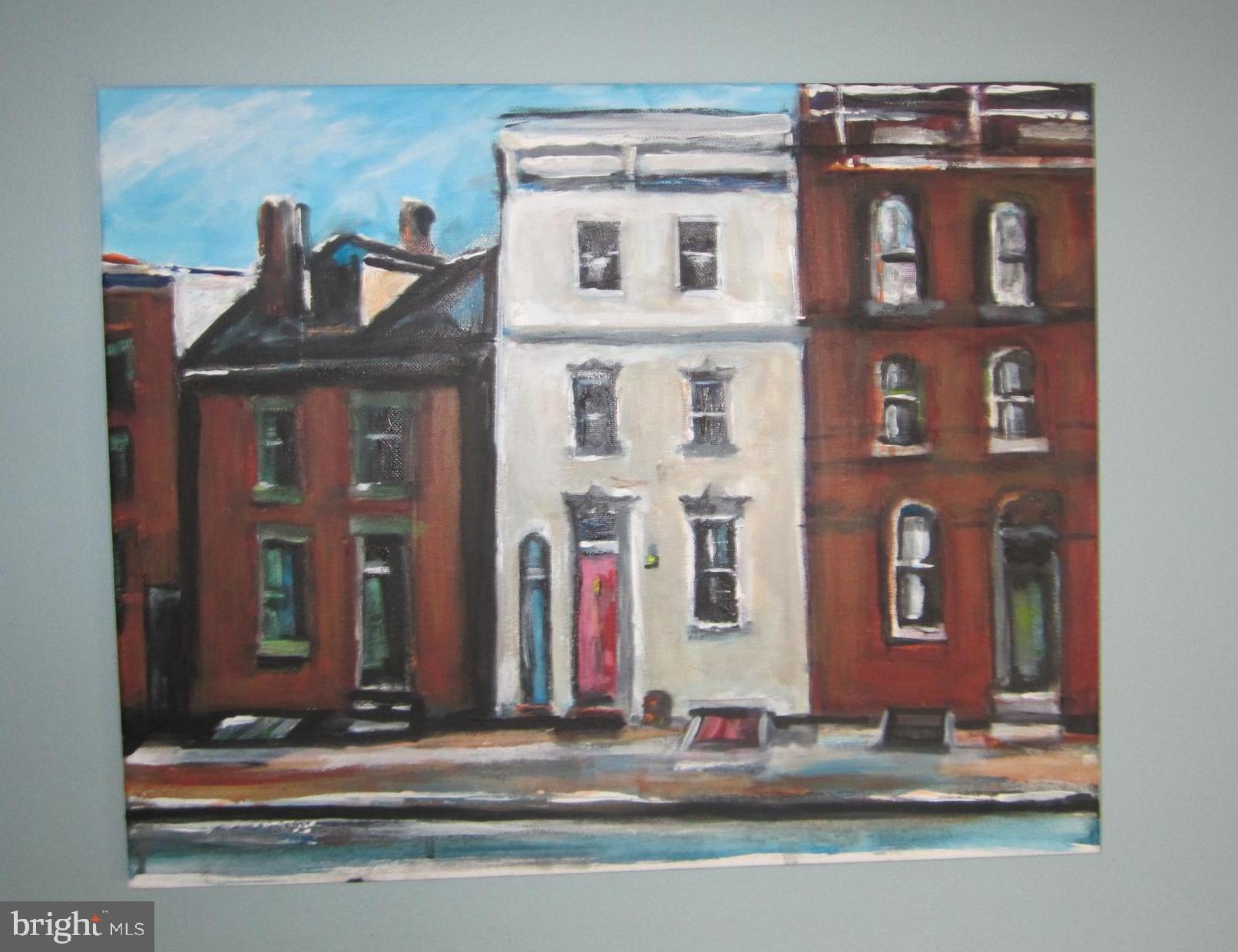 1611 Lancaster Street Baltimore, MD 21231 - Photo 27 of 43 a front view of a house with lots of windows