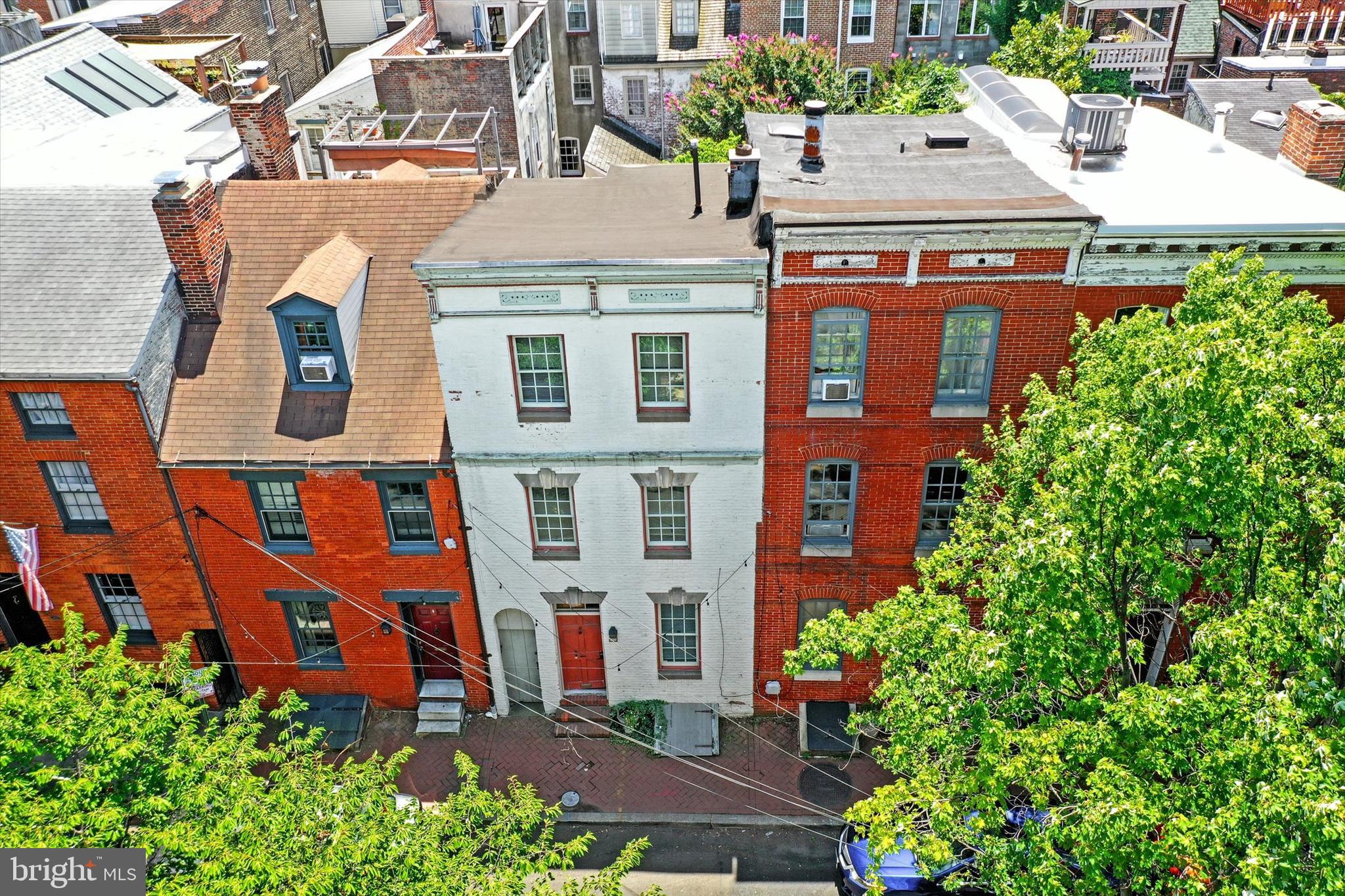 1611 Lancaster Street Baltimore, MD 21231 - Photo 31 of 43 an aerial view of a house with a yard