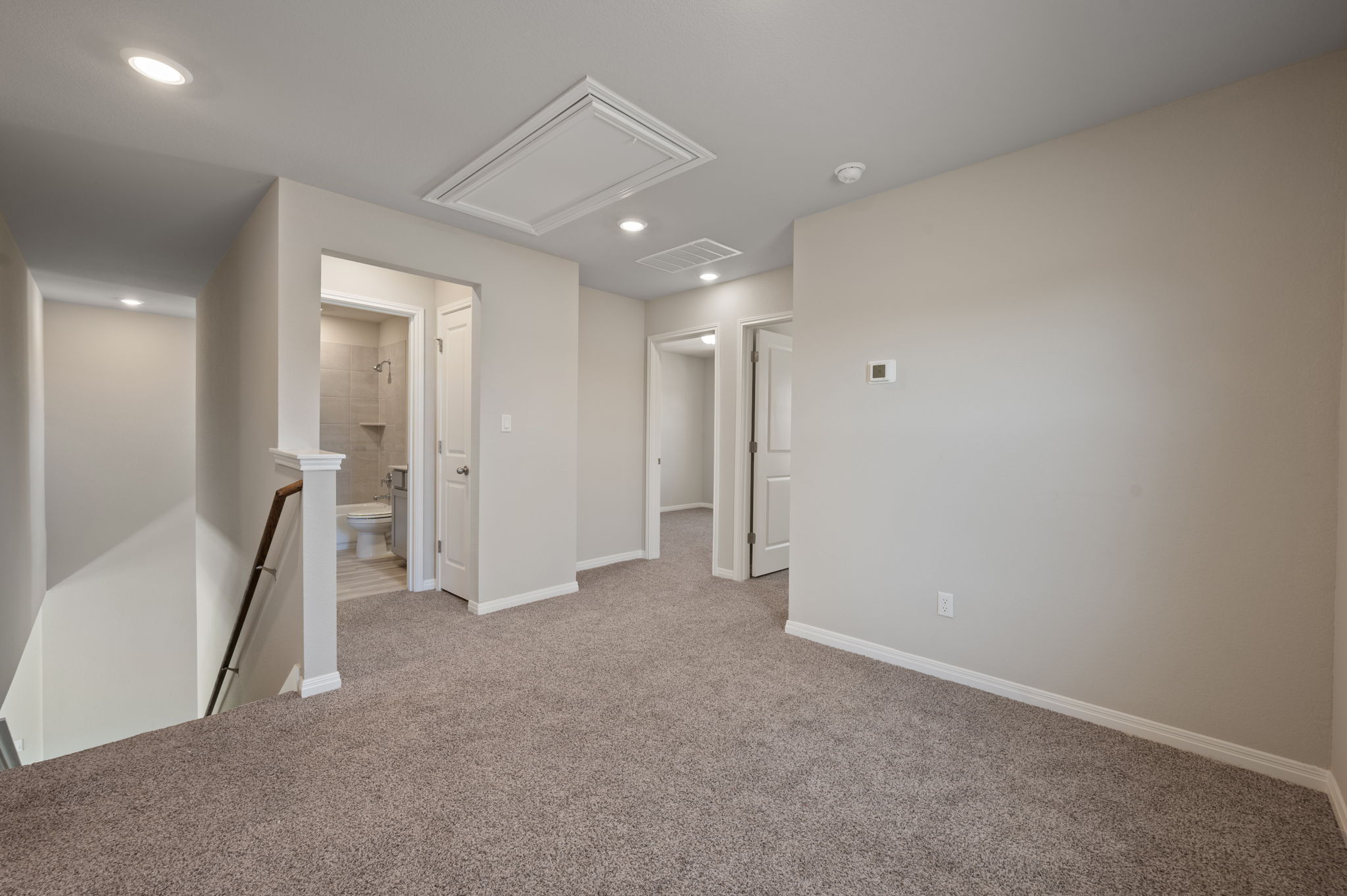 529 View Drive Georgetown, TX 78628 - Photo 12 of 20 Empty room with light carpet and recessed lighting