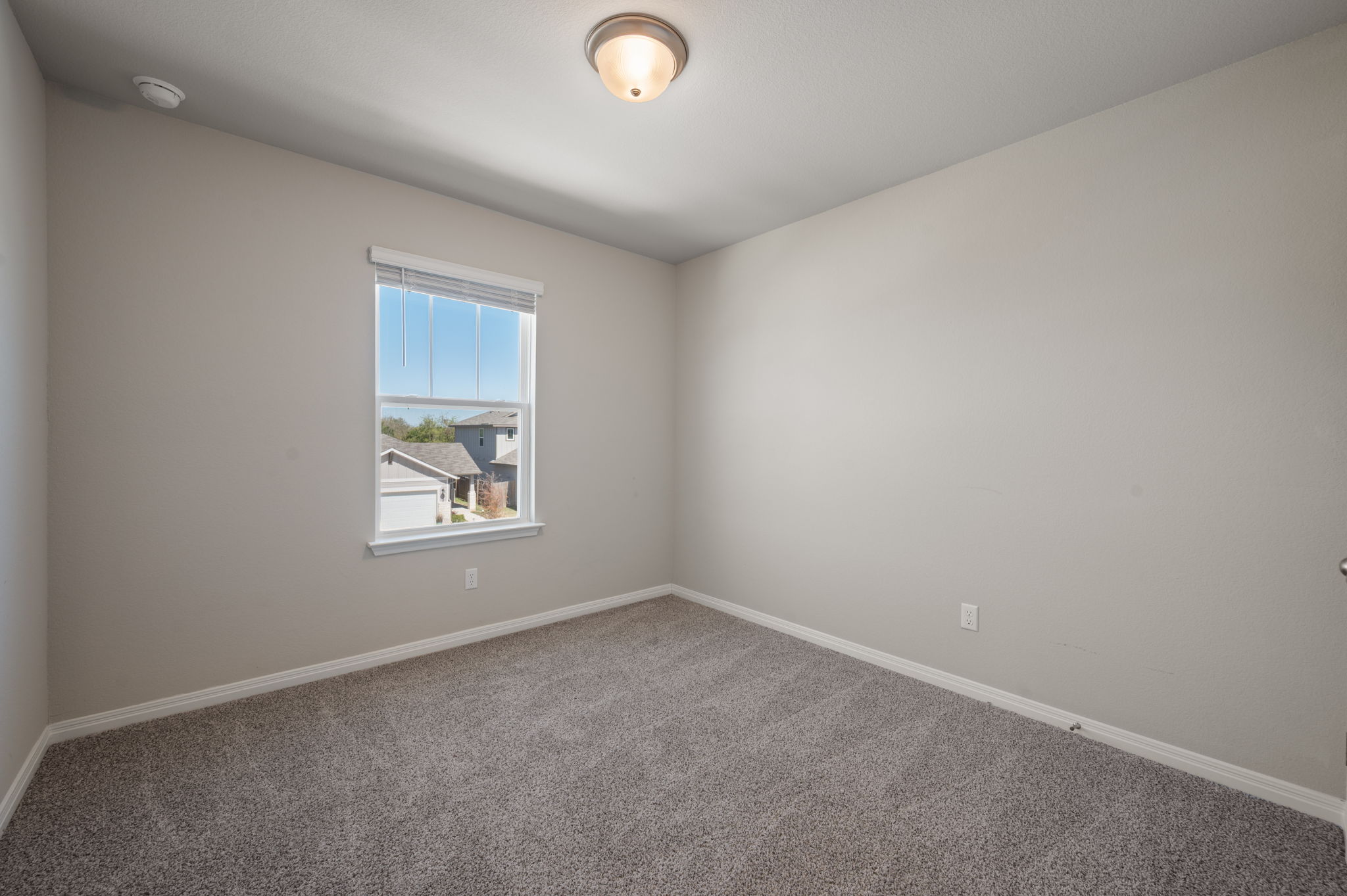 529 View Drive Georgetown, TX 78628 - Photo 17 of 20 Empty room featuring baseboards and carpet flooring