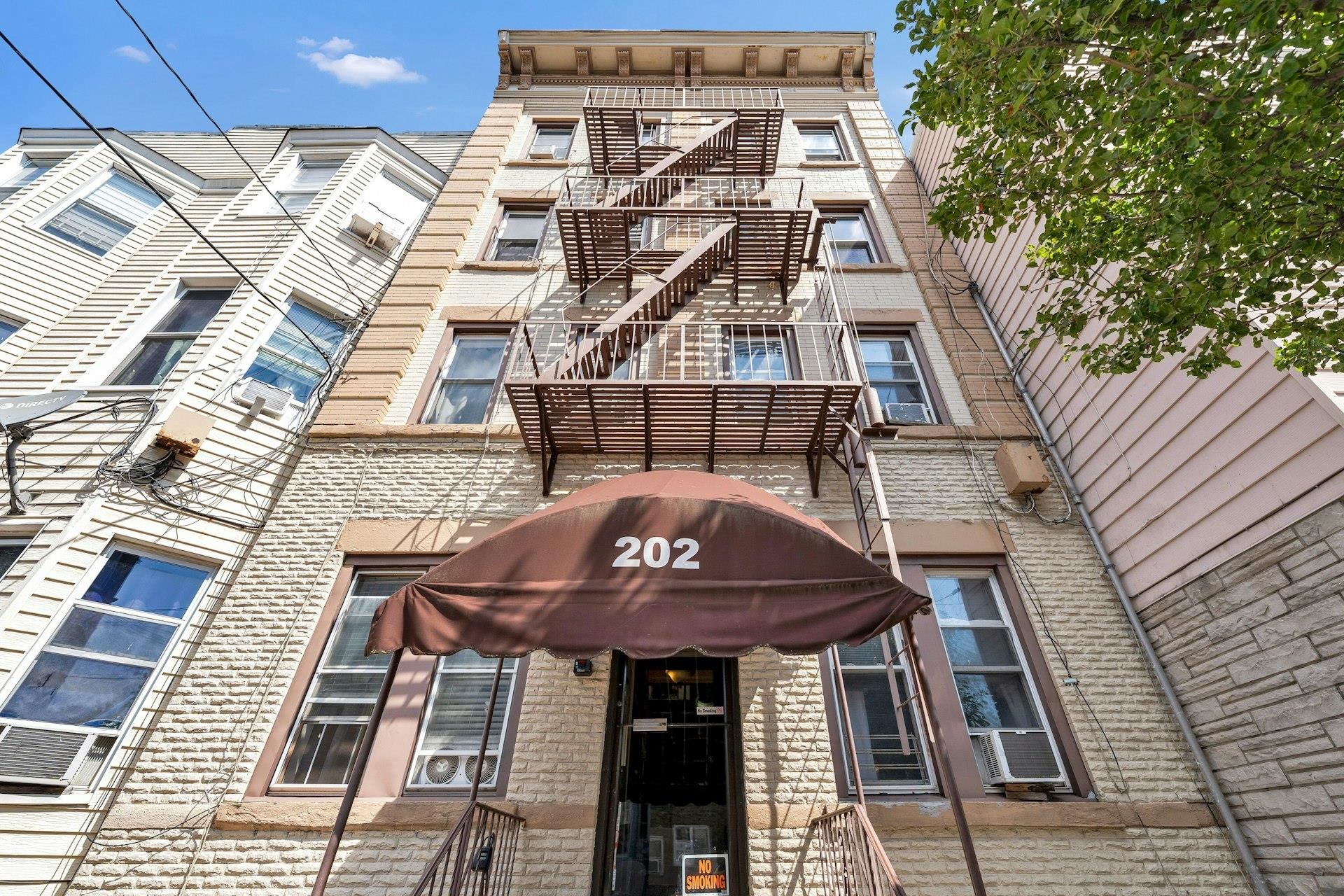 202 48th Street, Unit 3 Union City, NJ 07087 - Photo 17 of 17 a front view of a building