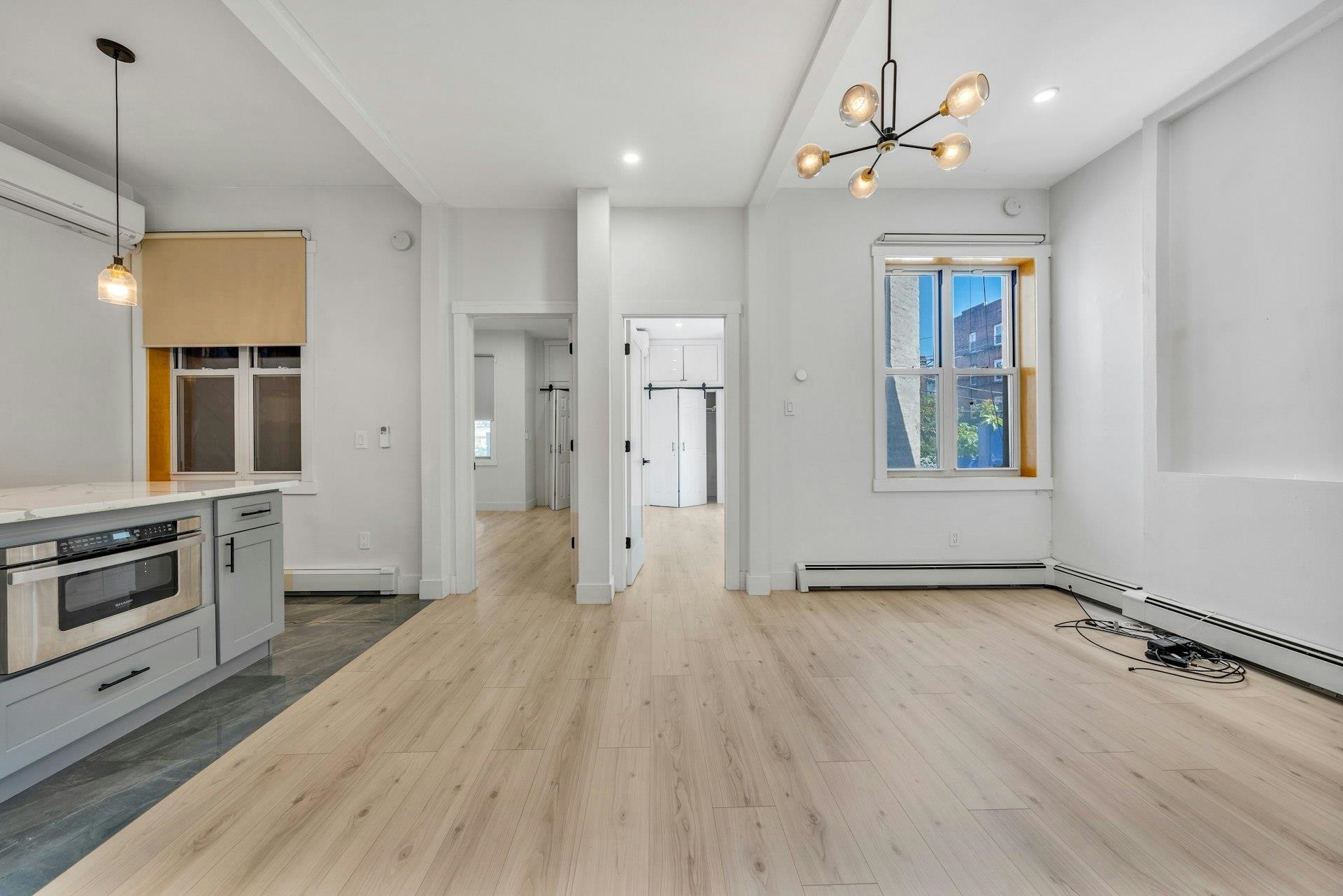 202 48th Street, Unit 3 Union City, NJ 07087 - Photo 2 of 17 a view of an empty room with a window