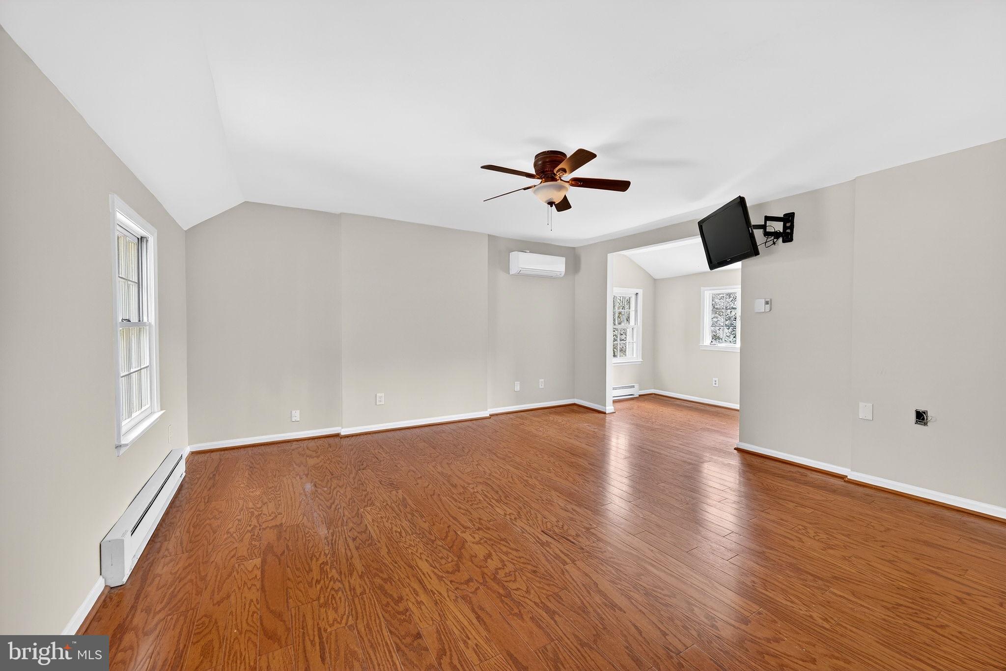 19635 Eagle Mill Road Parkton, MD 21120 - Photo 29 of 86 wooden floor in an empty room with a window