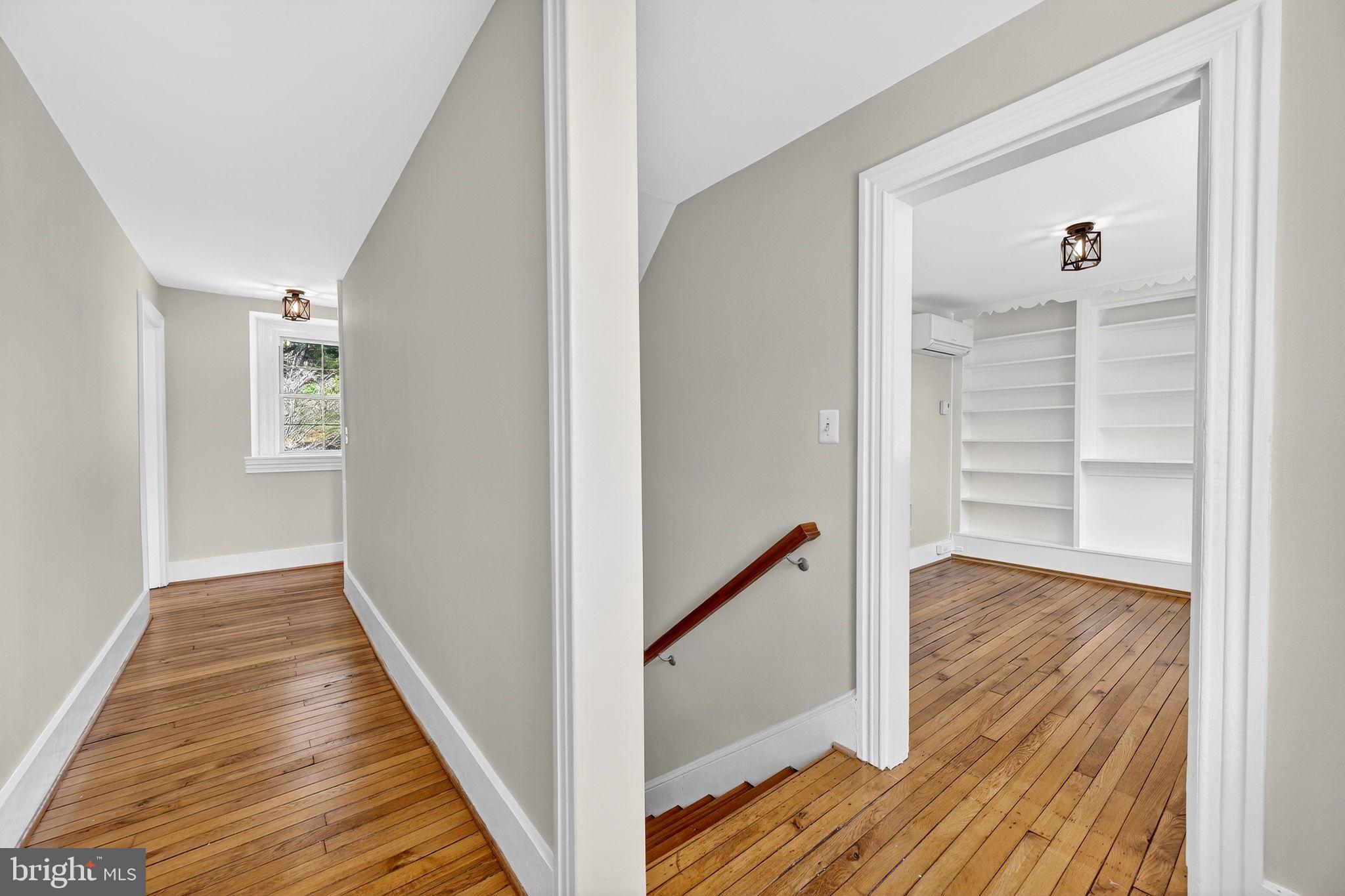 19635 Eagle Mill Road Parkton, MD 21120 - Photo 39 of 86 a view of a hallway with wooden floor and closet