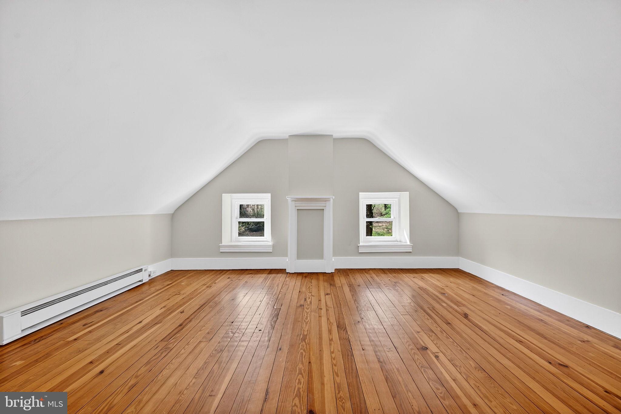 19635 Eagle Mill Road Parkton, MD 21120 - Photo 45 of 86 a view of an empty room with wooden floor and a window