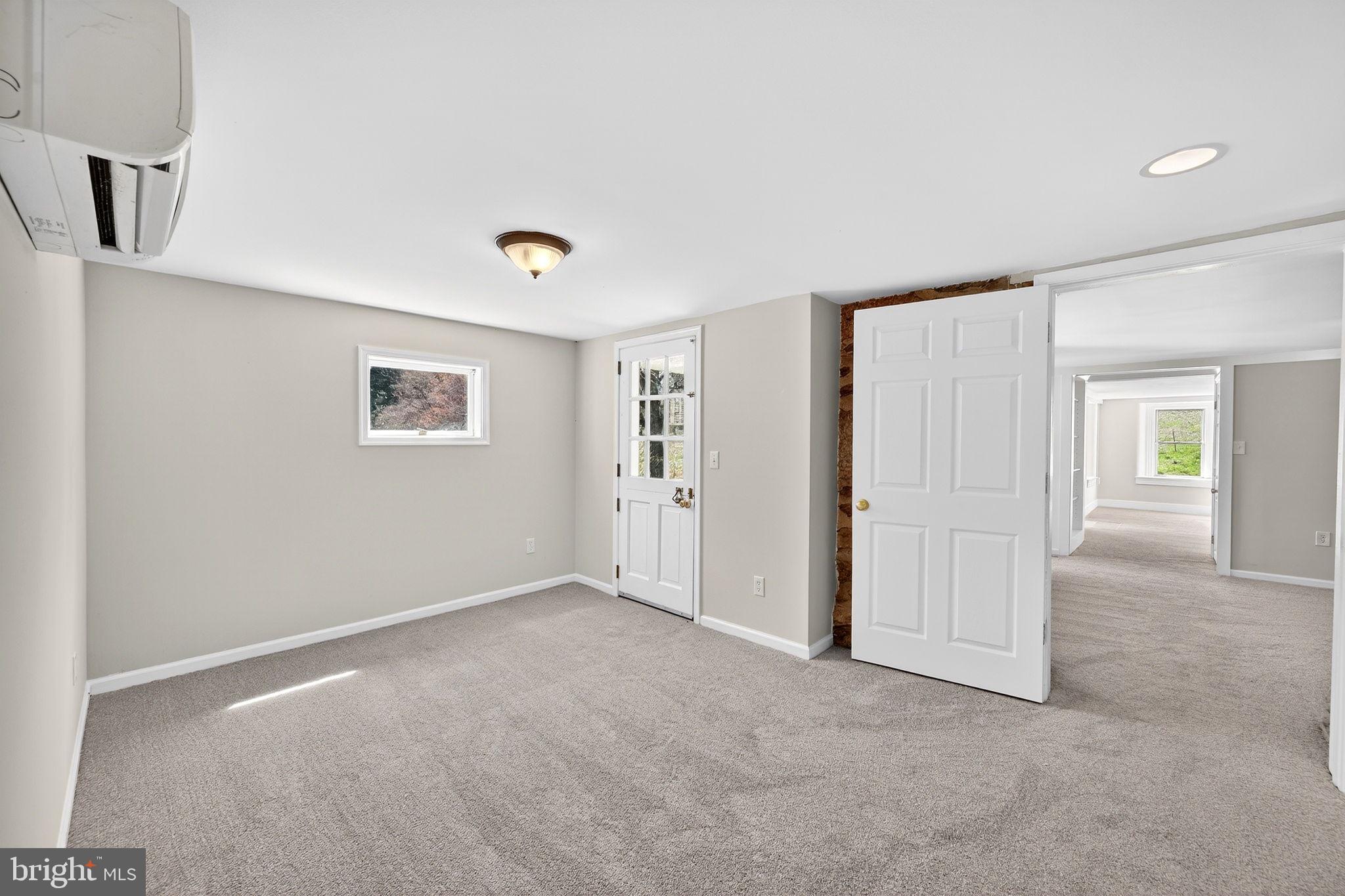 19635 Eagle Mill Road Parkton, MD 21120 - Photo 54 of 86 a view of an empty room with closet and a window