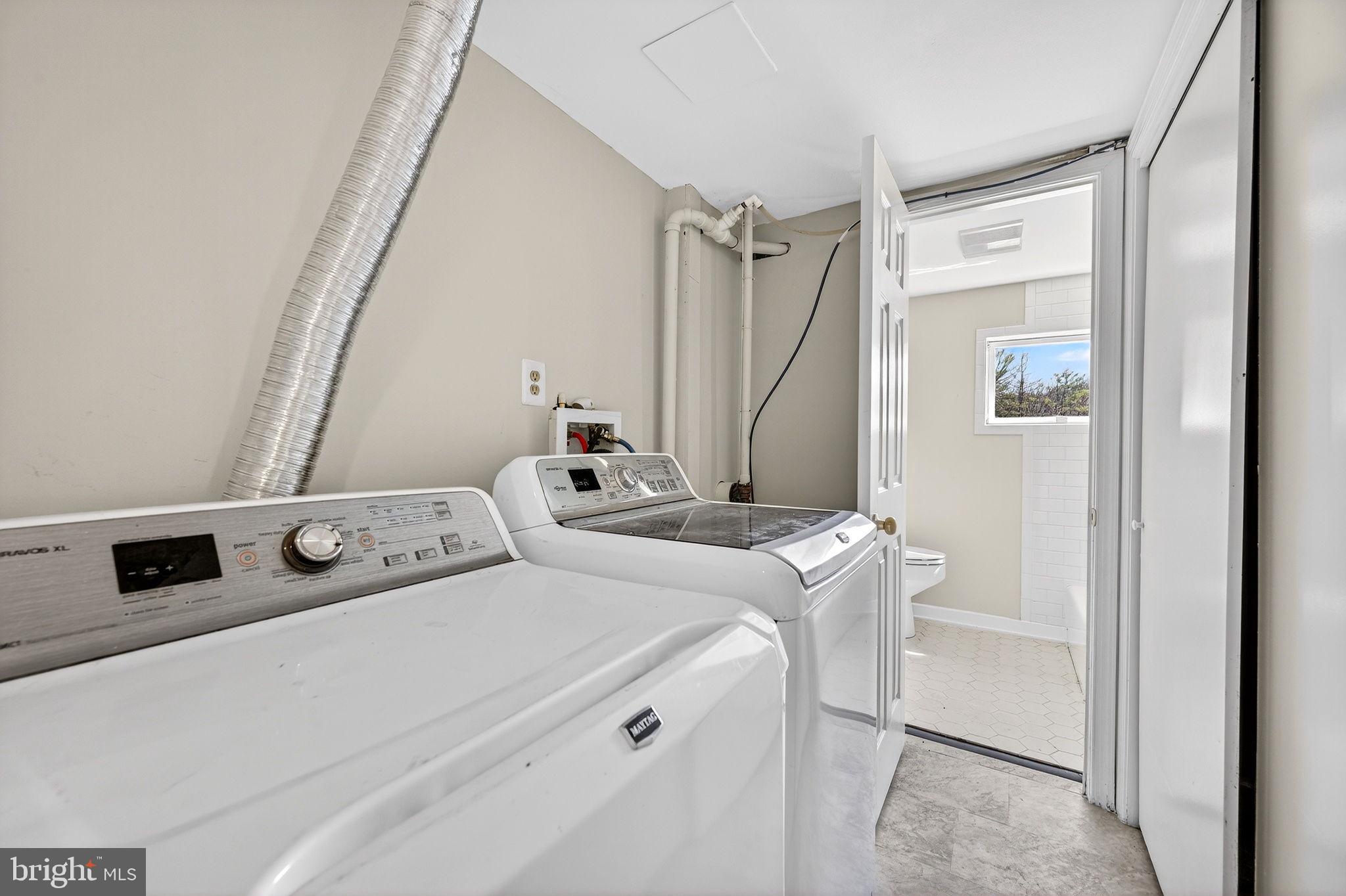 19635 Eagle Mill Road Parkton, MD 21120 - Photo 55 of 86 a bedroom with a bed and a mirror