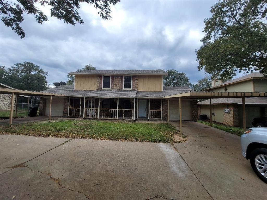 133 Lori Drive, Unit A & B Mineral Wells, TX 76067 - Photo 2 of 15 a view of a car parked in front of a house
