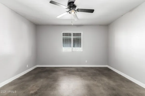 a view of a livingroom with a ceiling fan