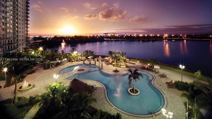 2641 North Flamingo Road, Unit TH5N Sunrise, FL 33323 - Photo 2 of 12 aerial view of a house with swimming pool and outdoor seating