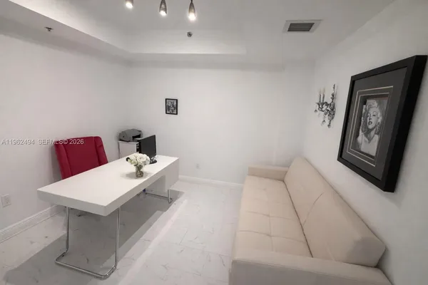 a living room with a couch and a table