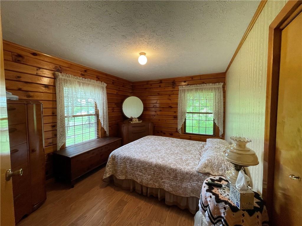 1844-1846 Cherry Tree Road Cherry Tree, PA 15724 - Photo 11 of 26 a bedroom with a bed and window