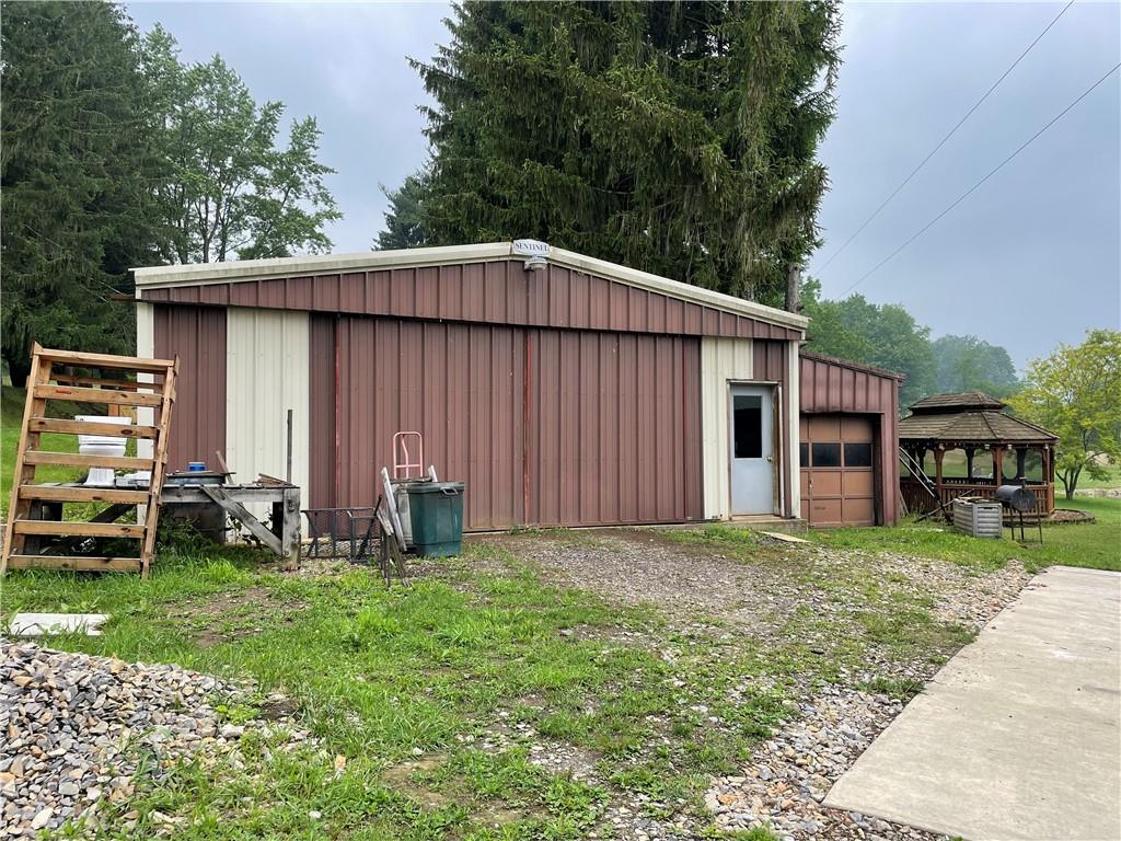1844-1846 Cherry Tree Road Cherry Tree, PA 15724 - Photo 16 of 26 a view of a house with backyard and garden