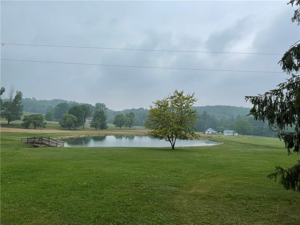 1844-1846 Cherry Tree Road Cherry Tree, PA 15724 - Photo 17 of 26 a view of a lake with a city