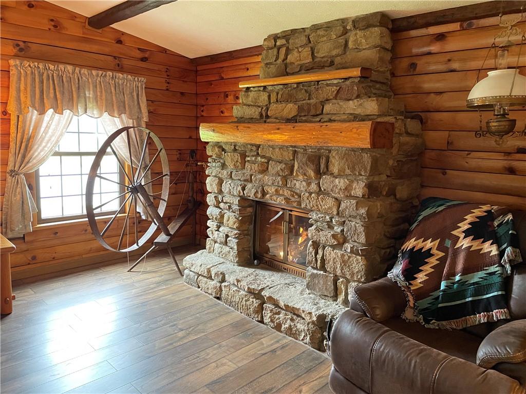 1844-1846 Cherry Tree Road Cherry Tree, PA 15724 - Photo 8 of 26 a living room with furniture and a fireplace