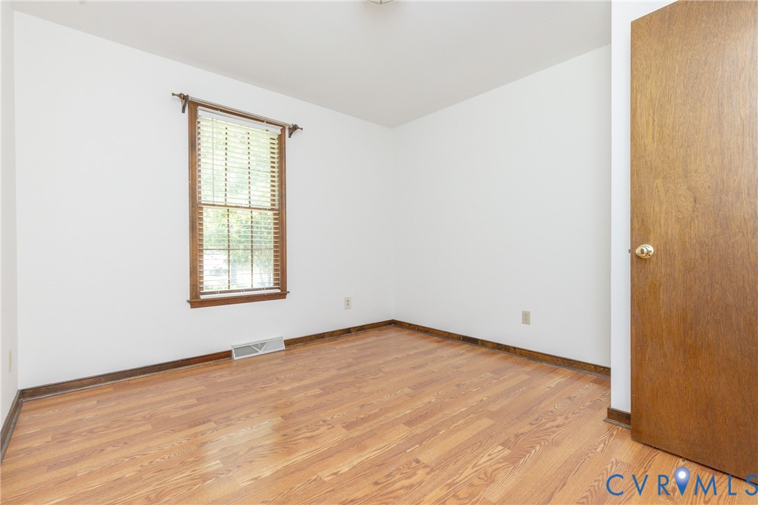617 Rebel Ridge Road Colonial Heights, VA 23834 - Photo 30 of 49 an empty room with windows and closet