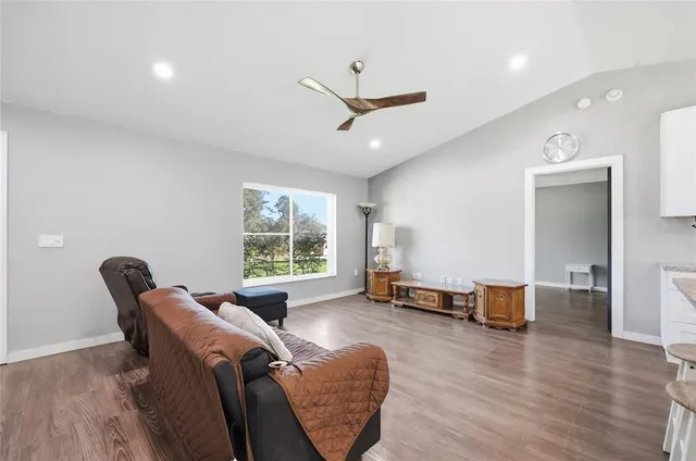 a living room with furniture and window