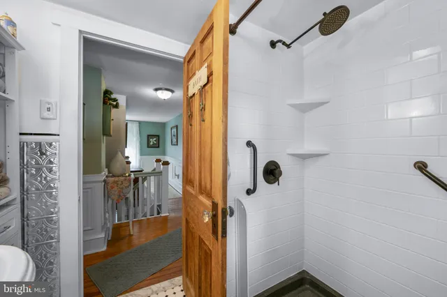 a view of a patio with a dining table and chairs