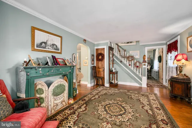 a workspace with furniture window and wooden floor