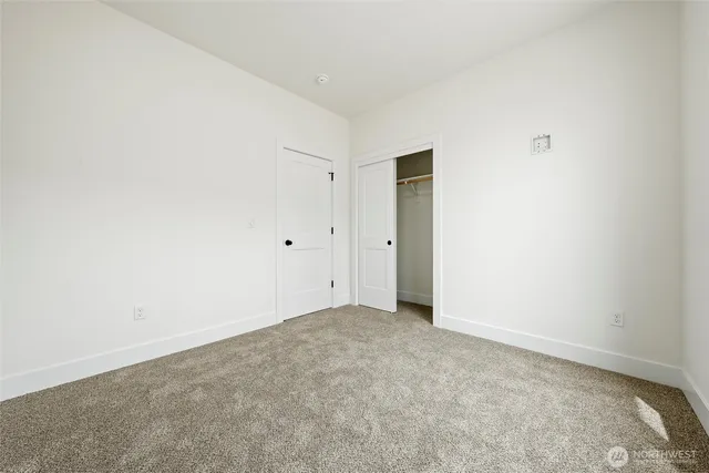 an empty room with an entryway