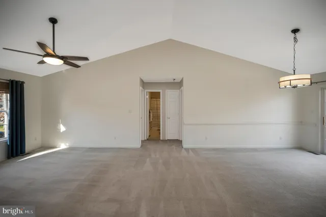 a kitchen with stainless steel appliances granite countertop white cabinets sink and dishwasher