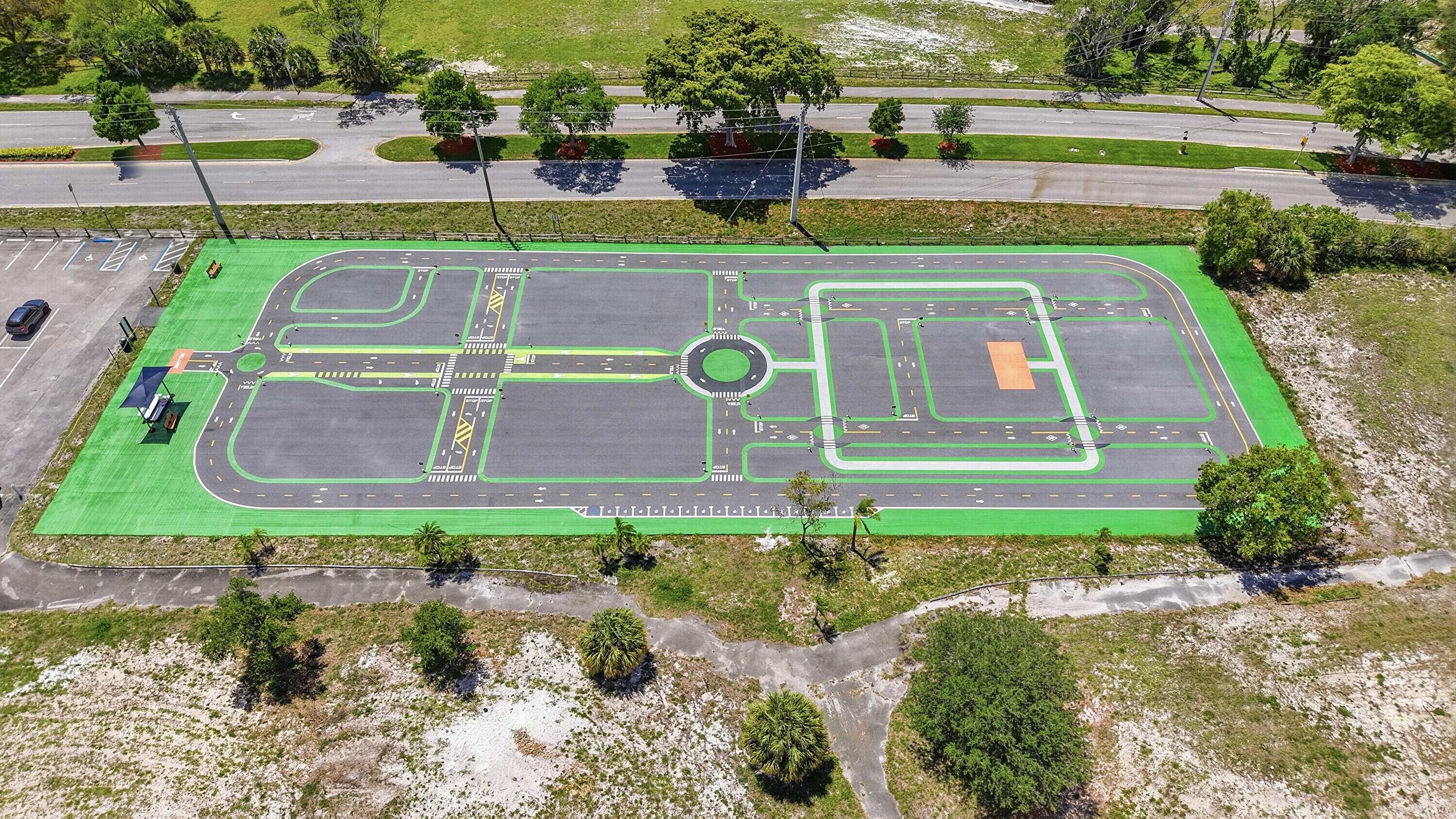 5700 Northwest 2nd Avenue, Unit 604 Boca Raton, FL 33487 - Photo 22 of 43 a view of a swimming pool with a yard