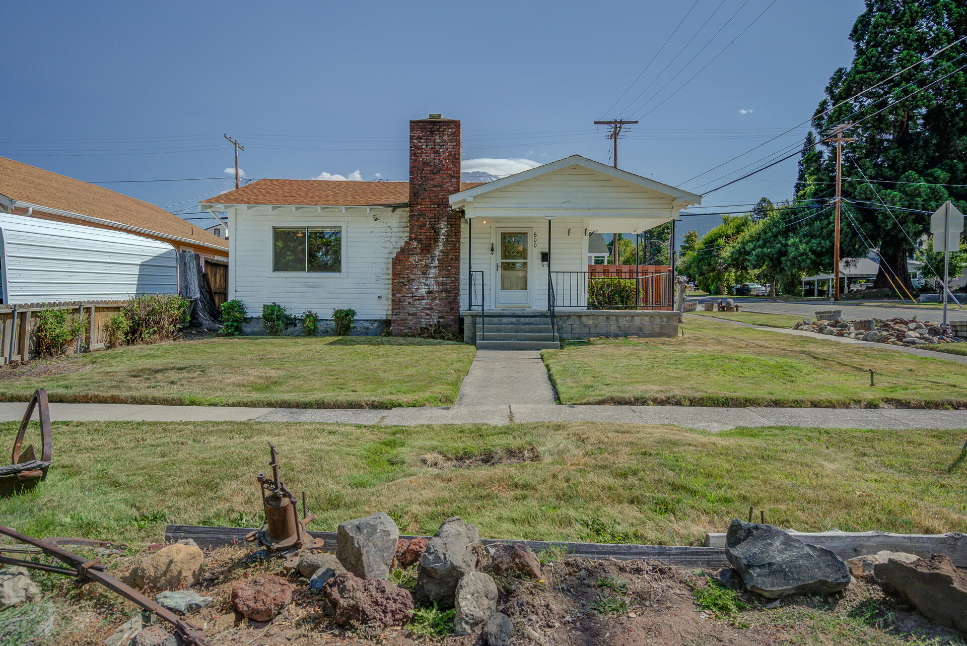 600 Cedar Street Mount Shasta, CA 96067 - Photo 1 of 26 a front view of a house with a yard