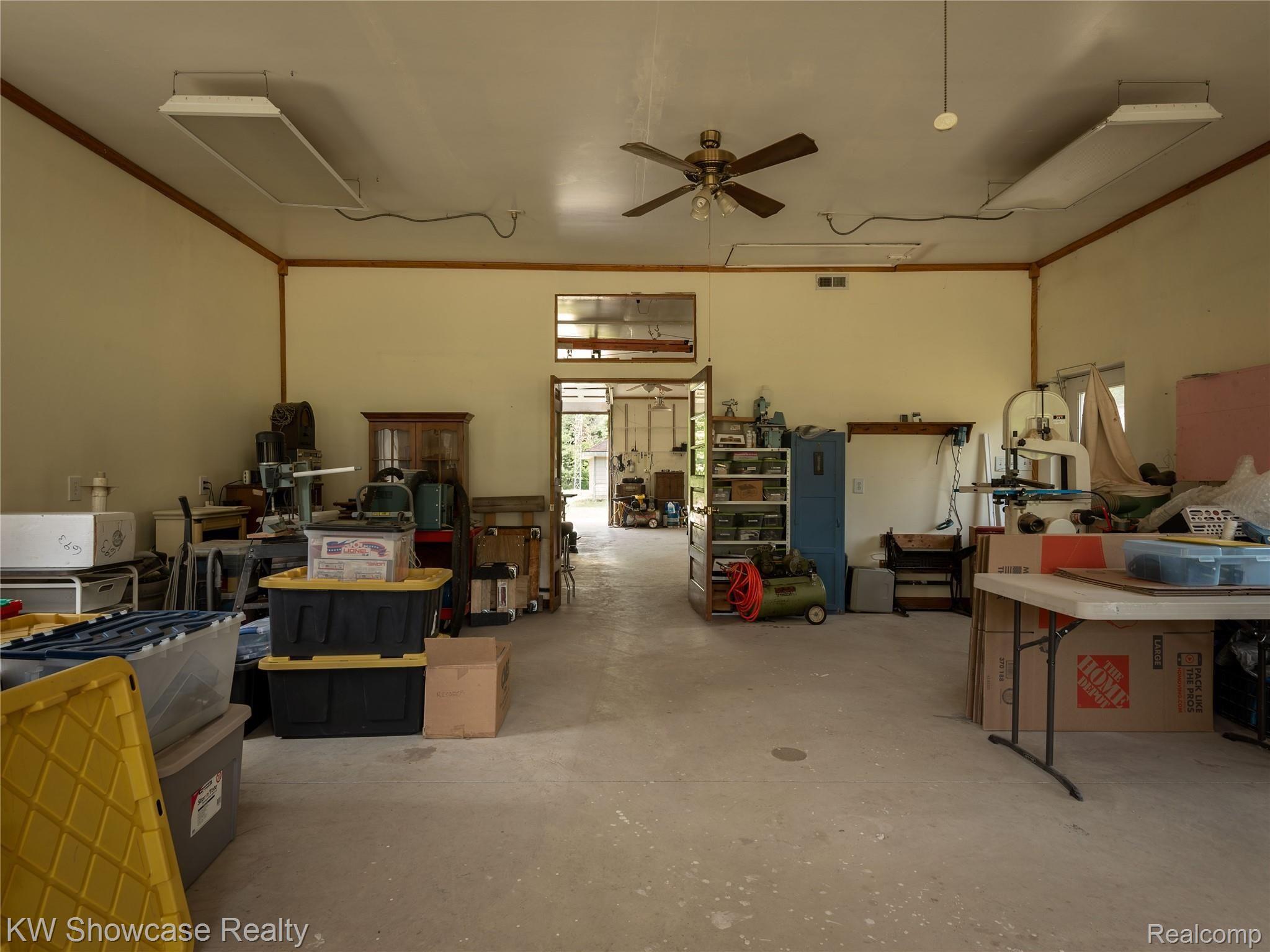 6020 North Tipsico Lake Road Holly, MI 48442 - Photo 44 of 54 44 INTERIOR SHOP BACK HALF.jpg