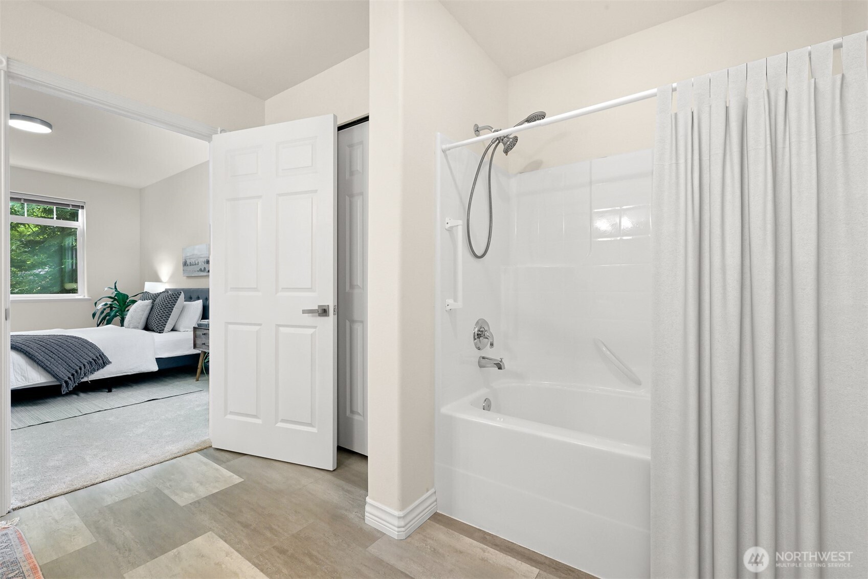 4579 El Dorado Way, Unit 107 Bellingham, WA 98226 - Photo 21 of 40 a bathroom with a tub shower and a sink