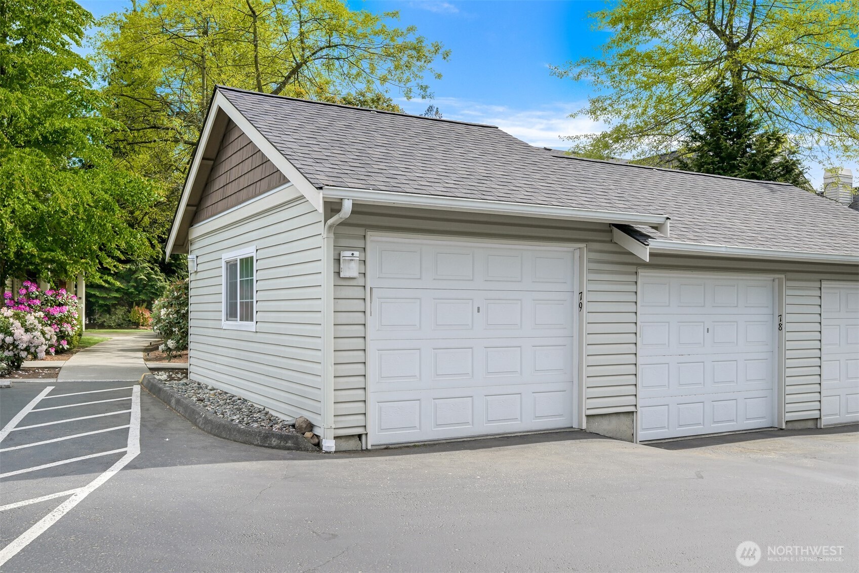 4579 El Dorado Way, Unit 107 Bellingham, WA 98226 - Photo 27 of 40 a view of garage and yard