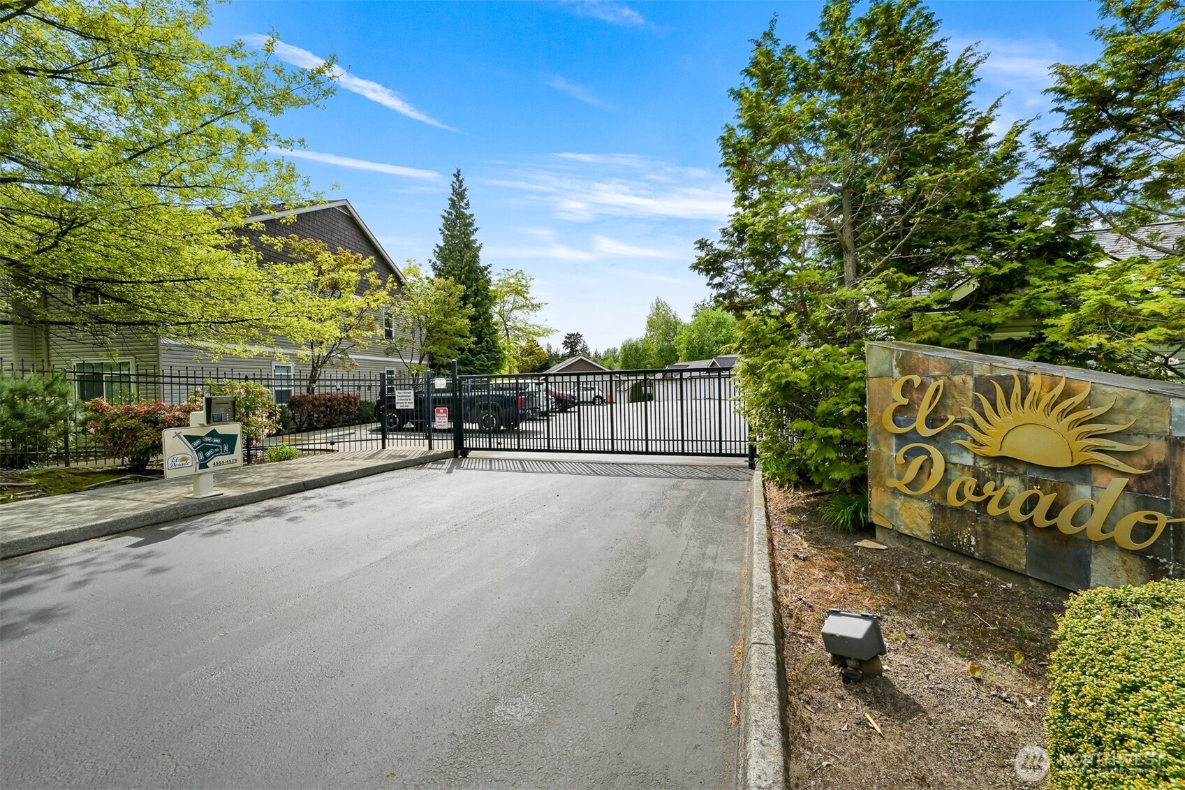 4579 El Dorado Way, Unit 107 Bellingham, WA 98226 - Photo 35 of 40 a view of a street with potted plants and a building