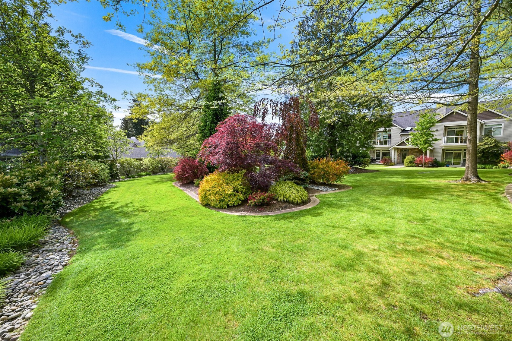 4579 El Dorado Way, Unit 107 Bellingham, WA 98226 - Photo 39 of 40 a view of a garden with a fountain