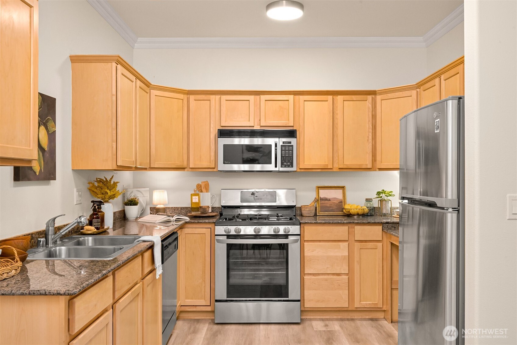 4579 El Dorado Way, Unit 107 Bellingham, WA 98226 - Photo 8 of 40 a kitchen with a sink stove and refrigerator